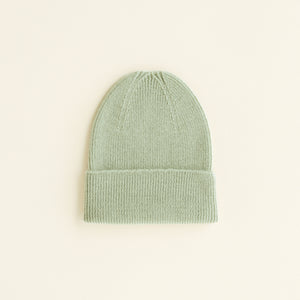 Hvid Newborn Beanie Fonzie Mint aus Merinowolle – weich, mulesingfrei & ideal für Neugeborene.