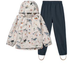 Liewood Regenset Pedia Sea Creature / Sandy – Wind- und wasserdichte Regenjacke mit abnehmbarer Kapuze und verstellbarer Regenhose.