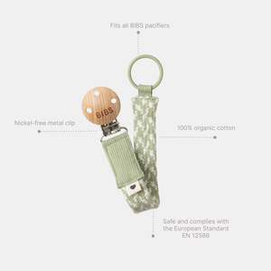 BIBS Pacifier Clip Braided Ivory/Vanilla – geflochtene Schnullerkette aus Bio-Baumwolle mit nickelfreiem Metallclip und Holzdetails.