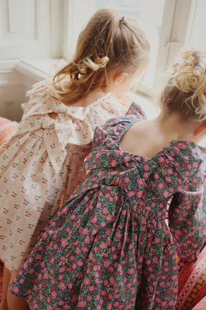 Robe Konges Sløjd "Cianna" motif nœud cerise rose