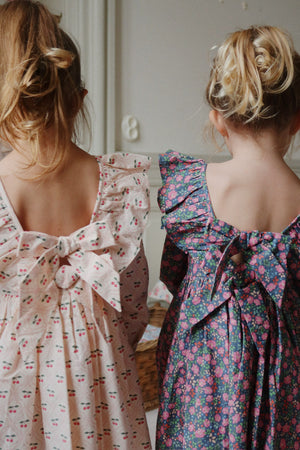 Robe Konges Sløjd "Cianna" motif nœud cerise rose