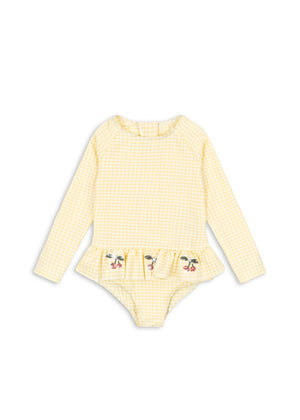 Konges Sløjd Etta Ls Swimsuit Banana Almond Check, Kinder-Langarm-Badeanzug aus Seersucker mit Rüschen und Pailletten